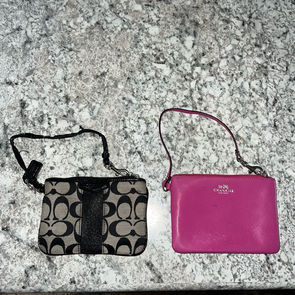 Two coach wristlets